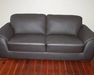 Leather Sofa     W-78”   D-33”   H-34”