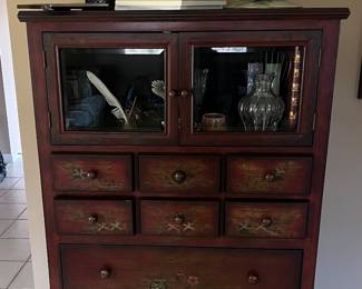 Chest of drawers with glass doors