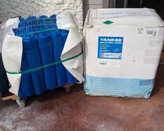 2 pool covers (one in box, one out of box)