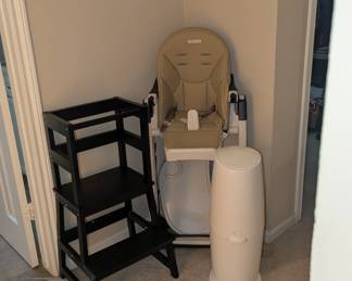 Assorted infant and toddler kid items - diaper pail, high chair, and toddler counter stool pictured