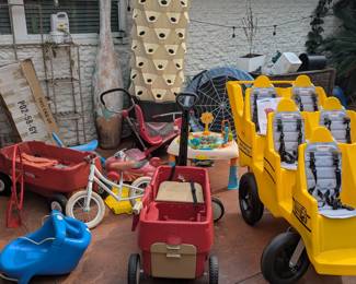 Assorted kids outdoor toys and wagons