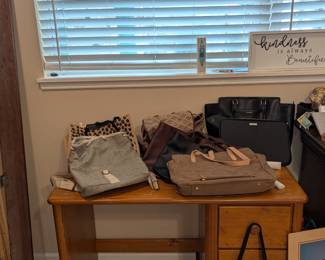 Assorted purses, clutches, handbags, backpacks, and coin purses - NAME BRAND, TAGS ON, like new condition