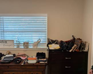 Assorted purses, clutches, handbags, backpacks, and coin purses - NAME BRAND, TAGS ON, like new condition