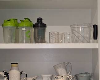 Assorted kitchen ware - shakers, plates, tea sets, saucers, etc