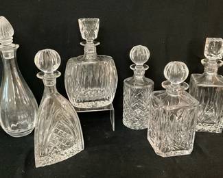 Six Elegantly Cut Decanters