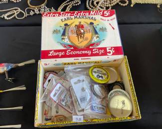 The cigar box of car placard’s from Valmeyer