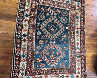 Antique Kazak Hand Woven Rug
Kazak rugs are known for their bold colors, geometric patterns & durability.
37” x 51”