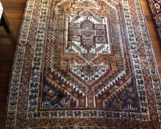 Antique or vintage Persian Qashqai rug.
74" x 49"
Has plush loss, mostly around the border.
