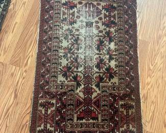 Small Persian Rug
Has some wear and fraying
41” x 25”
