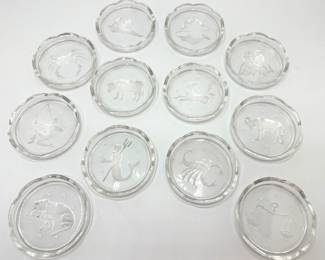 1970s Val St. Lambert Coasters Embossed With Zodiac Signs, Full Set Of 12, Signed
Lot #: 138