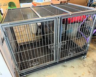 AWESOME rolling metal dog/pet kennel that can convert from a single kennel to a double kennel.