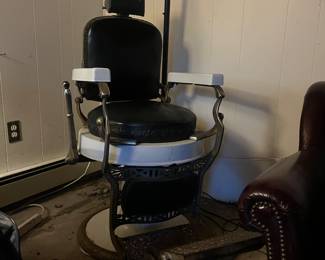 Antique barbers chair with working hydraulics