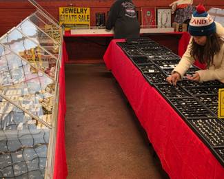 Table on the left is all GOLD. Table on the right is all $15 Sterling.