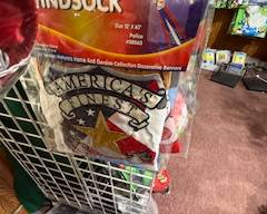 Packaged rainbow-themed windsock with bright multicolor design, perfect for hanging on porches, patios, gardens, or outdoor displays. Adds vibrant motion and color.