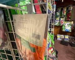 Packaged garden windsock with bright orange and green outdoor design, ready to hang for porch, patio, yard, or seasonal décor. Adds color and movement to any space.