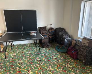 Prince Ping Pong table that folds and rolls for easy storage.  Many sets of luggage and individual pieces.