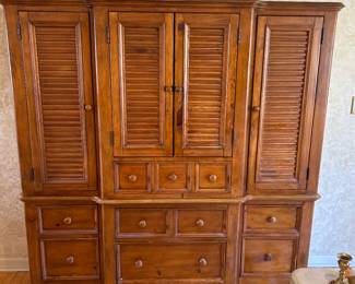 Knotty pine buffet/hutch. 
