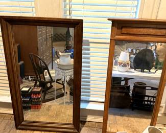 mirror on right goes with mid century modern bedroom suit. There are 2 of them even though only one is showing in photo