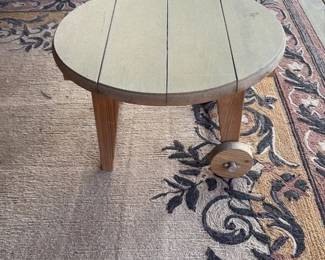 Round Wooden Side Table with Decorative Rug