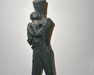 Bronze Sculpture of a Man with a Hat
