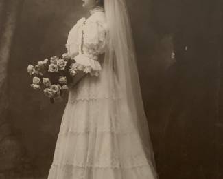 Photo of bride wearing dress. Picture comes with dress.