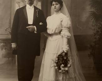 Photo of bride and groom wearing dress. Comes with dress.