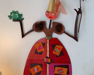 large metal folk art wall hanging of Princess