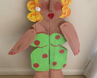 large wood cut-out of a bathing beauty