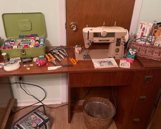 Great vintage sewing machine and sewing cabinet