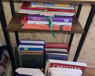 Faith based books and hymnals in the bottom section