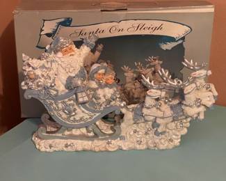 Great display, has matching 3-piece Santa figurine set