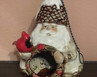 This is an adorable Santa Ceramic Bird House.