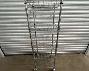 Adjustable Chrome Wire Rolling Storage Rack β 4 Tier Metal Shelf with Locking Casters