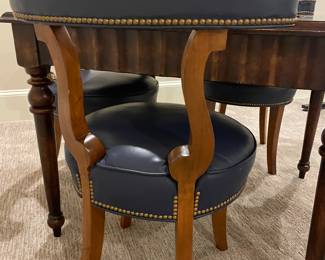4 Navy leather chairs with game table