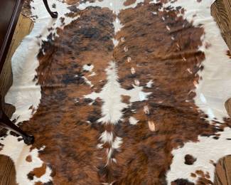 hide area rug, 6’8”