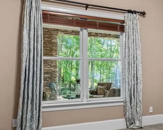 Custom drapes ( rods and rings stay with the house)
