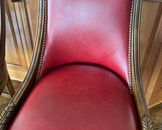 Frontgate red leather bar-height bar stools.