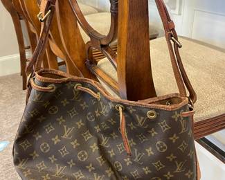 Louis Vuitton (authentic, but with age-related wear)