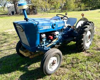 Rebuilt Ford 2600 Tractor with a disc plow, scoop, hay fork and blade. It has a lot of new: front tires, carburetor, fuel pump, hydraulic hoses to front cooler, brakes on rear, spark plug wires, fuel tank cleaned, new starter and fuel filter. New battery! **Taking bids only. Highest bidder at 3:00pm Sunday, Nov 23, takes the tractor and implements. Must be able to remove all items off the property.**