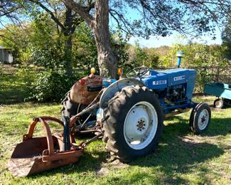 Rebuilt Ford 2600 Tractor with a disc plow, scoop, hay fork and blade. It has a lot of new: front tires, carburetor, fuel pump, hydraulic hoses to front cooler, brakes on rear, spark plug wires, fuel tank cleaned, new starter and fuel filter. New battery! **Taking bids only. Highest bidder at 3:00pm Sunday, Nov 23, takes the tractor and implements. Must be able to remove all items off the property.**