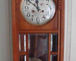 c 1910 Gustav Becker pendulum wall clock.  Chimes the hour and half hour.