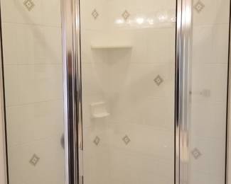Glass shower surround
