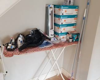 Ironing board; irons; lightbulbs