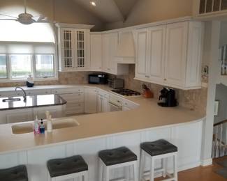 Wood-Mode kitchen with extensive amount of upper and lower cabinets