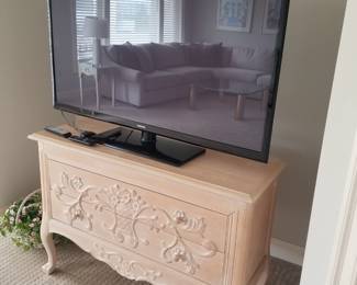 Ornate two-drawer chest; TV