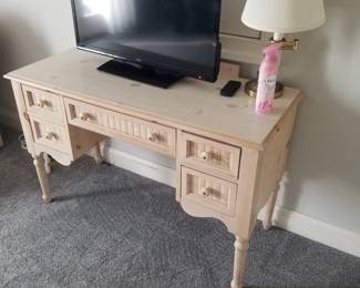 5-drawer desk; TV; table lamp