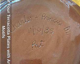 Set of Four Terracotta Plates with Animal Motif 