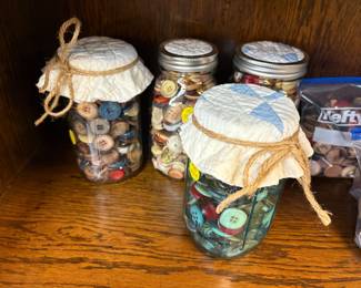 Buttons, buttons in jars with quilt top lids.  Great for using or adding to your collection.