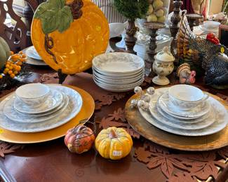 Thanksgiving table including placemats, china, chargers, decor, turkeys, pumpkins and more