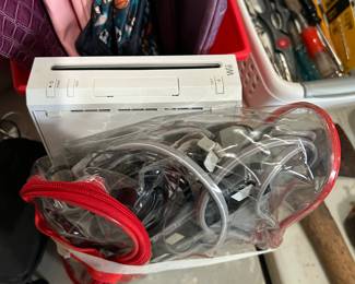 #124	Wii game and controllers	 $20.00 			
